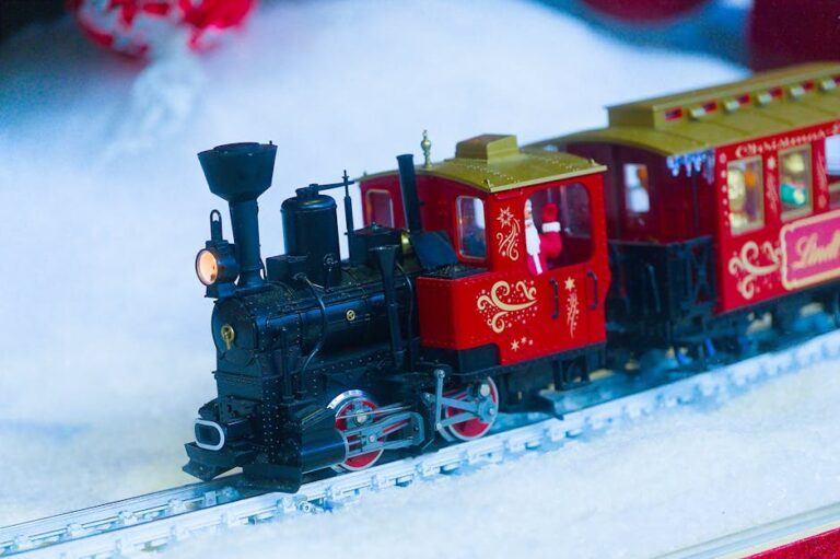 Miniature steam train in festive decor, perfect for adding holiday cheer.