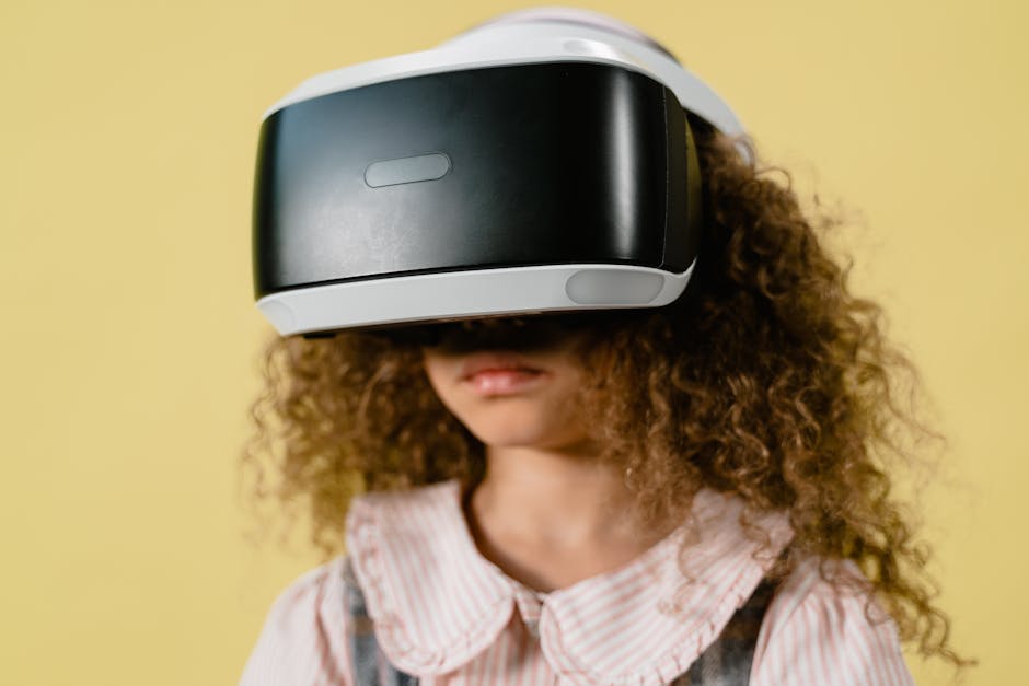 A girl with curly hair using a VR headset against a yellow background.
