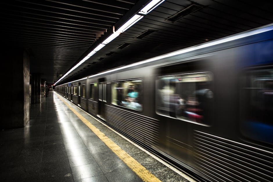 Long exposure shot of a subway train speeding through a station in São Paulo.